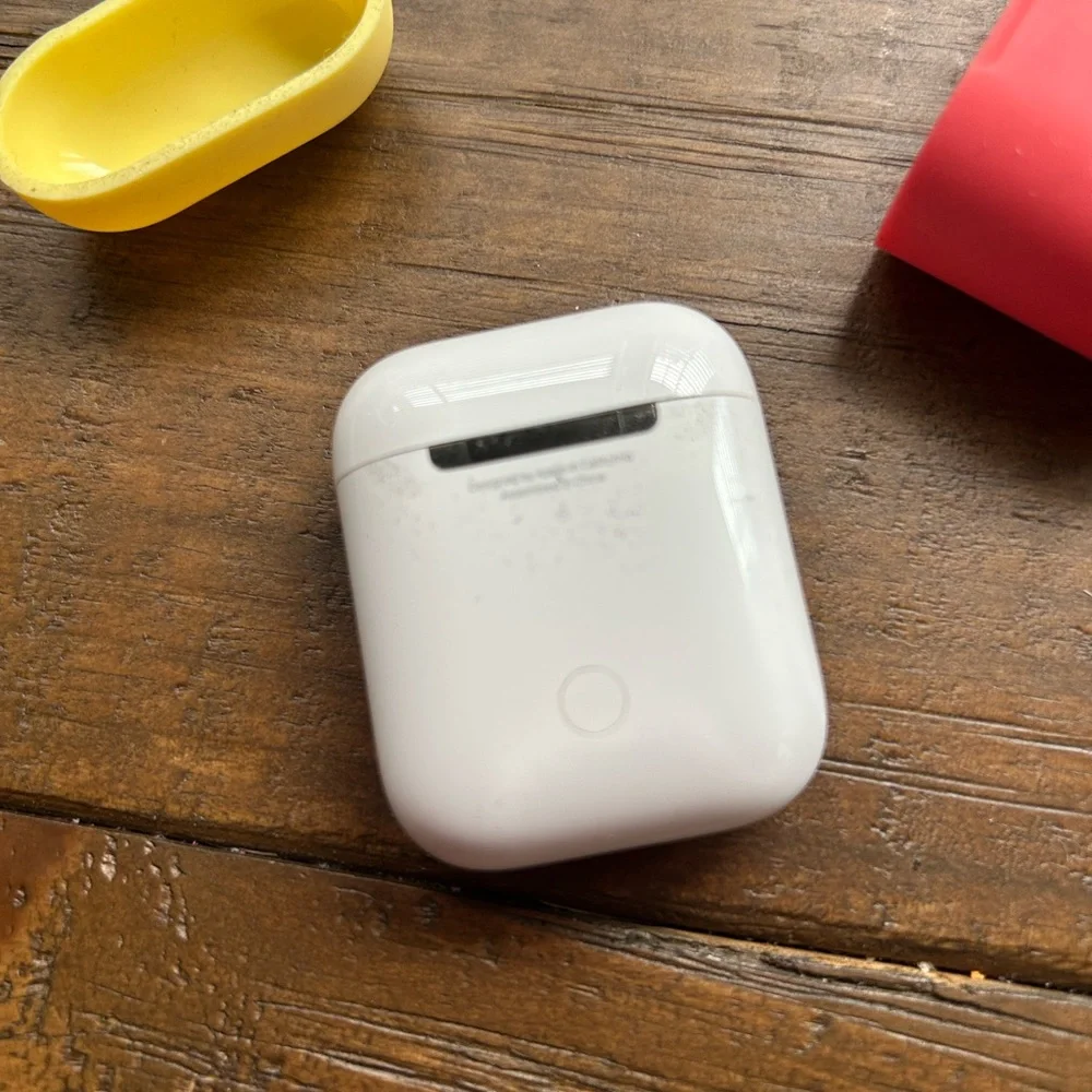 AirPods with Red and Yellow Case - Picture 5 of 7